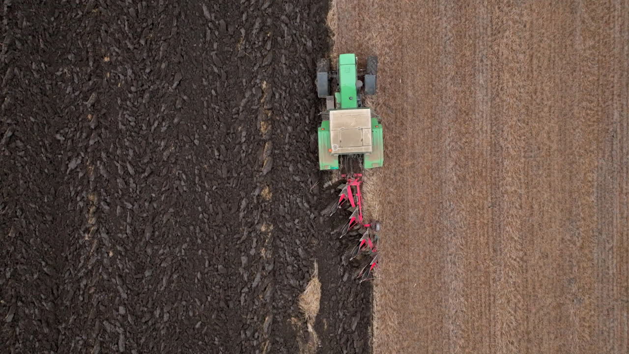 Tractor Plowing Field Aerial View