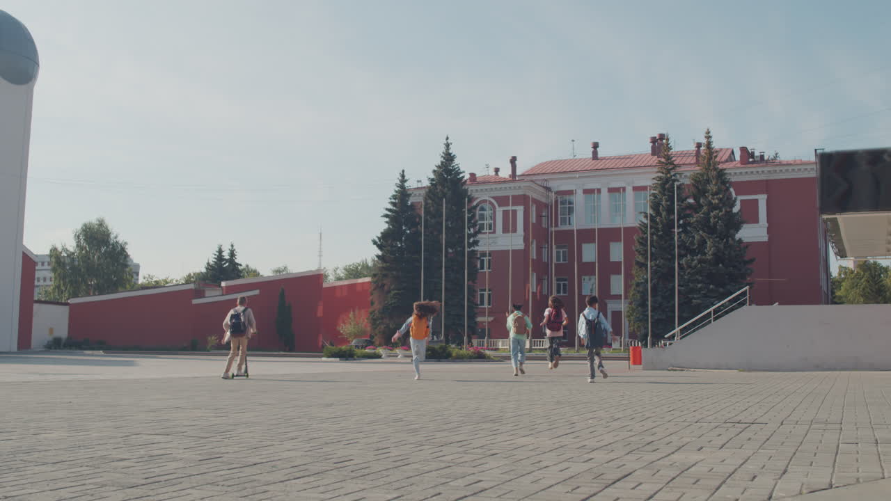 Excited Children Running To School