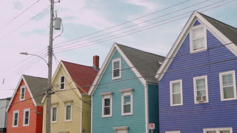 Multicoloured-red,-yellow,-green,-purple-houses-durning-the-afternoon-in-Halifax,-Nova-Scotia,-Canada-during-the-Summer-or-Autumn-2