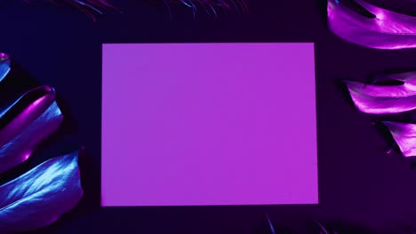 animation of green lush leaves over purple background with copy space