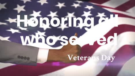 honoring all who served veterans day text over hand showing thumbs up against waving american flag