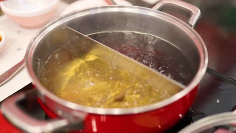 soup boiling in a divided hotpot