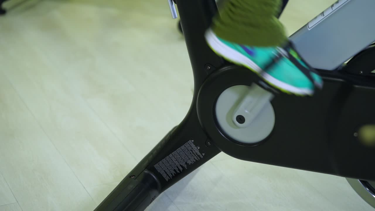 Person Cycling on a Stationary Bike