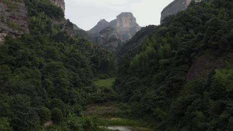 Beautiful-Bajiao-Shan-mountain-valley-in-Guangzhou-China,-4K-aerial-view