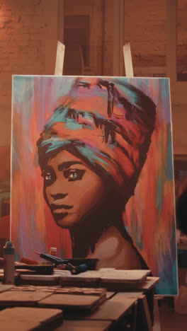 african woman portrait painting in an art studio