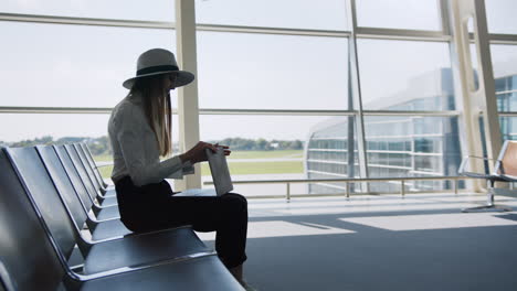 woman waiting at airport