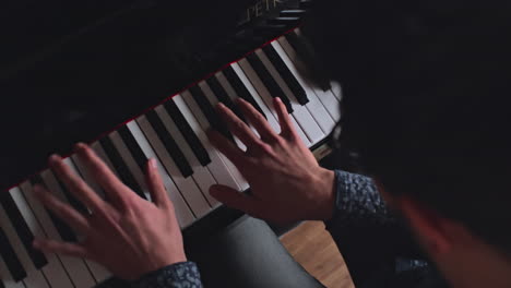 Captivating-piano-performance-showcasing-skilled-hands-and-focused-expression