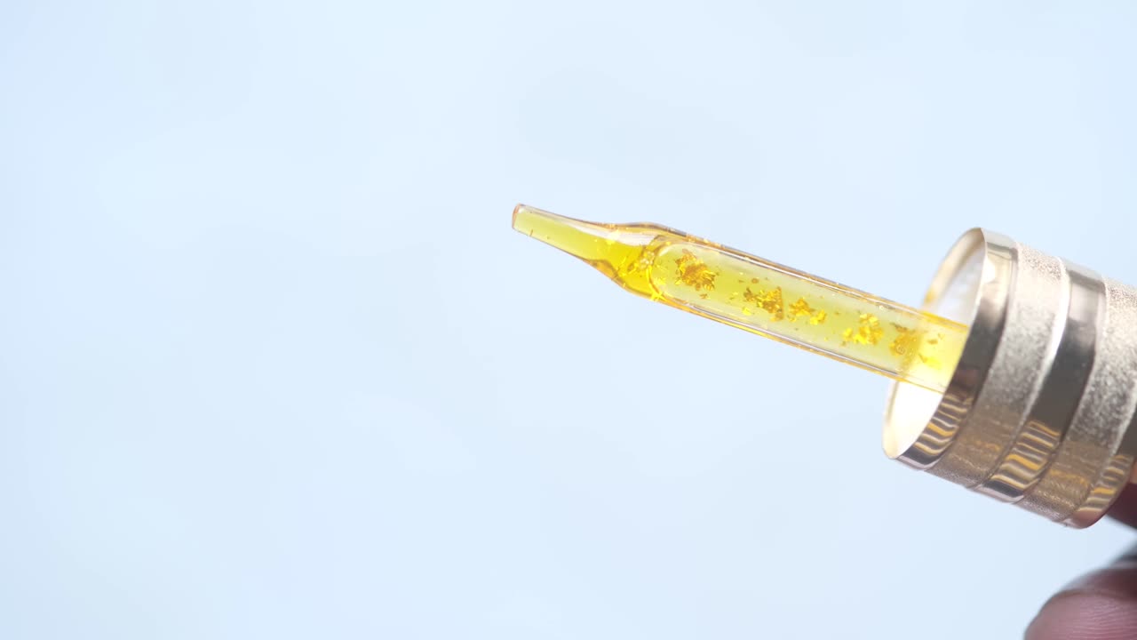 botella de goteo de suero de oro