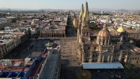 Guadalajara-Aerial-Pan-Down-Reveal-of-Plaza-de-Guadalajara-at-Golden-Hour