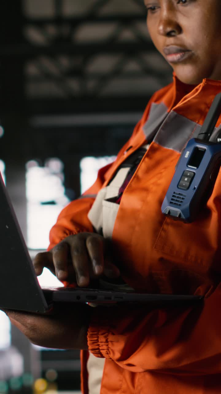 Vertical Video Engineering specialist, black woman, monitoring production process