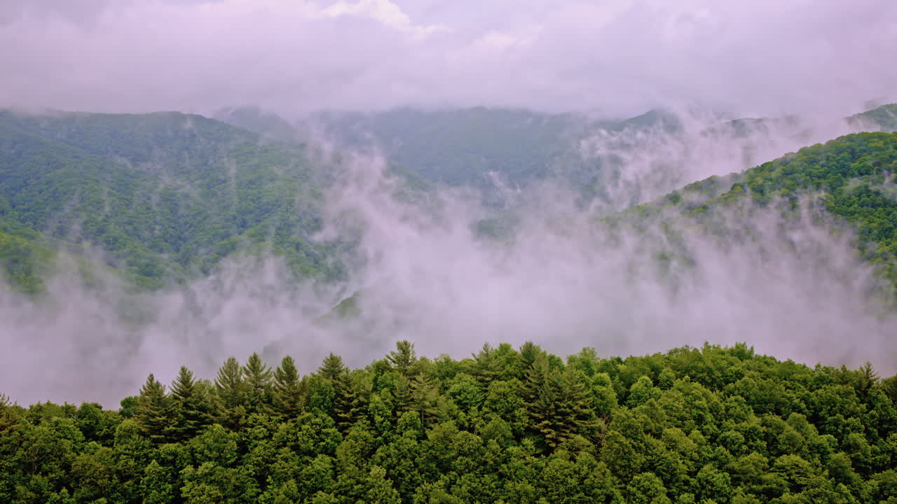 Drone footage of the mist-laden Smoky Mountain landscape