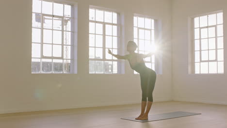 beautiful yoga woman practicing mountain pose enjoying fitness lifestyle exercising in studio stretching flexible body training early morning meditation on exercise mat