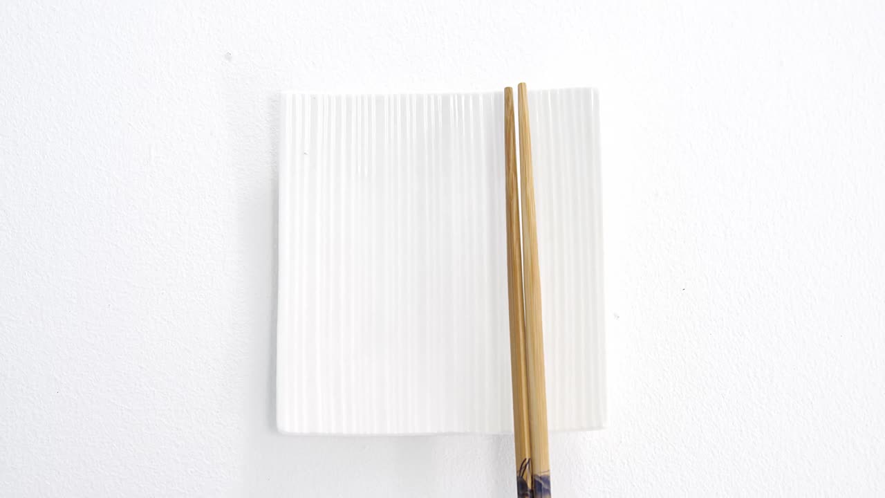 Chopstick with empty plate