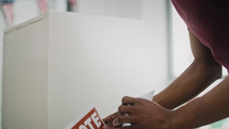 real time video of black man  voting in face mask