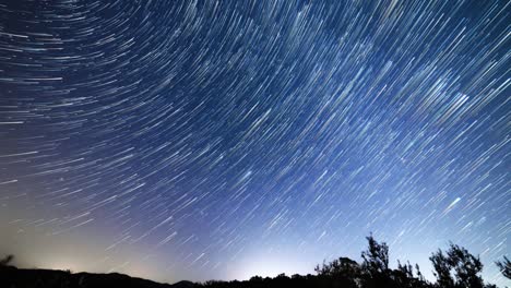 time lapse of star trails, night sky in the tuscan country