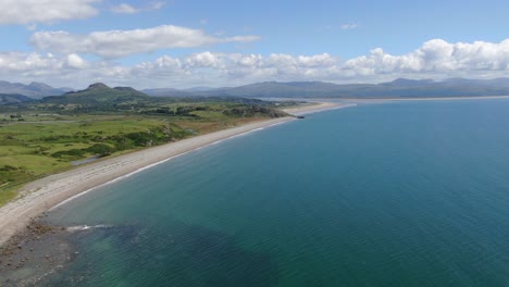 Aerial-Shot-of-Criccieth-Beach,-North-Wales-in-Summer