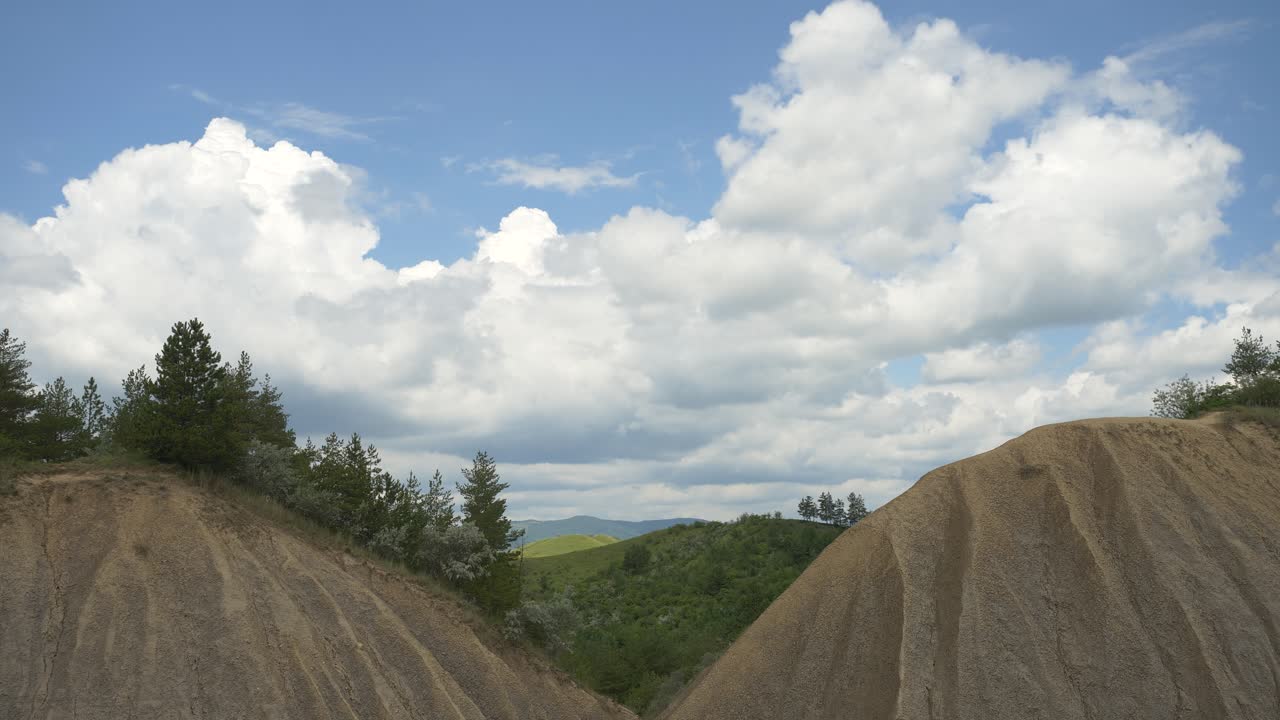 Spectacular Time Lapse of Clouds Flowing Over Berca Mud Volcanoes, Romania