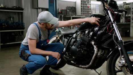 young man with cap at the garage