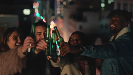 happy rooftop party friends drinking alcohol making toast celebrating weekend social gathering enjoying hanging out together at night