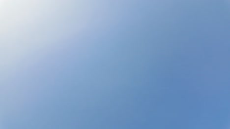 clear blue sky views with a person and backpack
