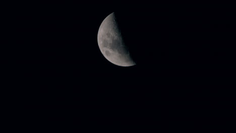 last quarter moon moving at the night sky