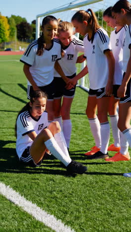 youth girls soccer team on the field