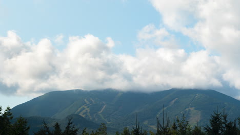 amazing cloud cover over white mountains ski hill in the summer