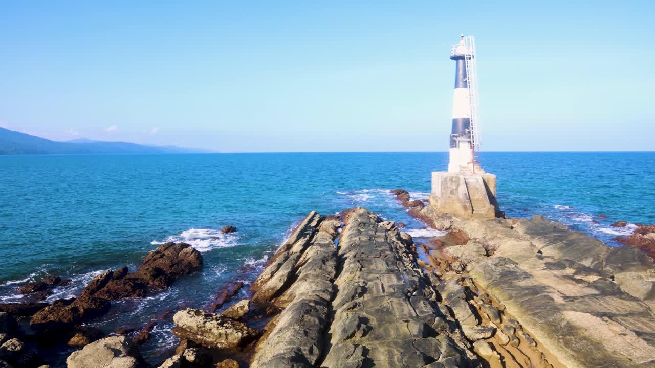 Andaman's iconic lighthouse on Ross Island overlooks the clear blue horizon