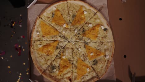 Top-View-Of-Hands-Adults-Taking-Pizza-Slices-From-Cardboard-Box