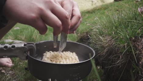 instant quick noodles meal fix out in the nature in slow motion