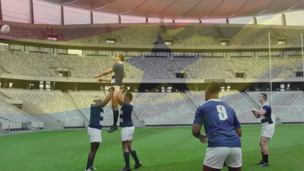 Practicing line-out technique, rugby players in empty stadium focusing on teamwork