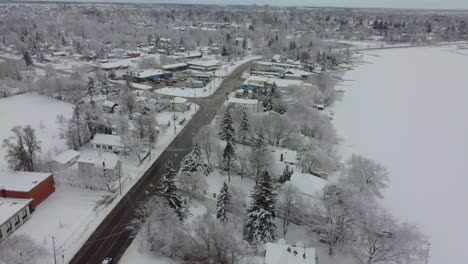 aerial snow covered neighborhood during a overcast winter day