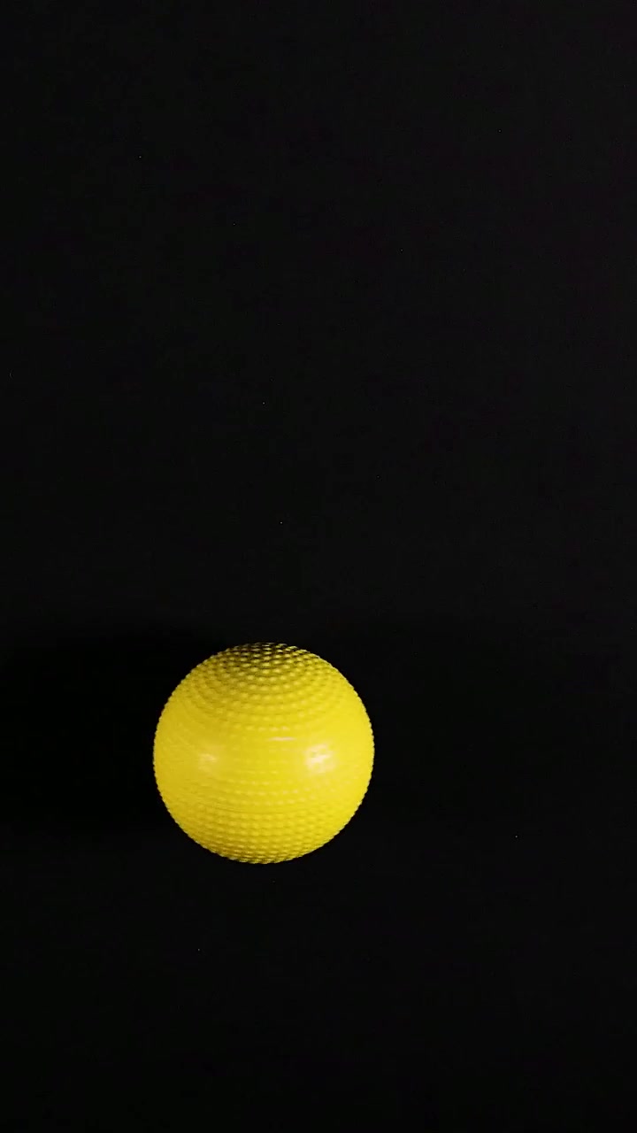 A yellow ball moves horizontally across frames