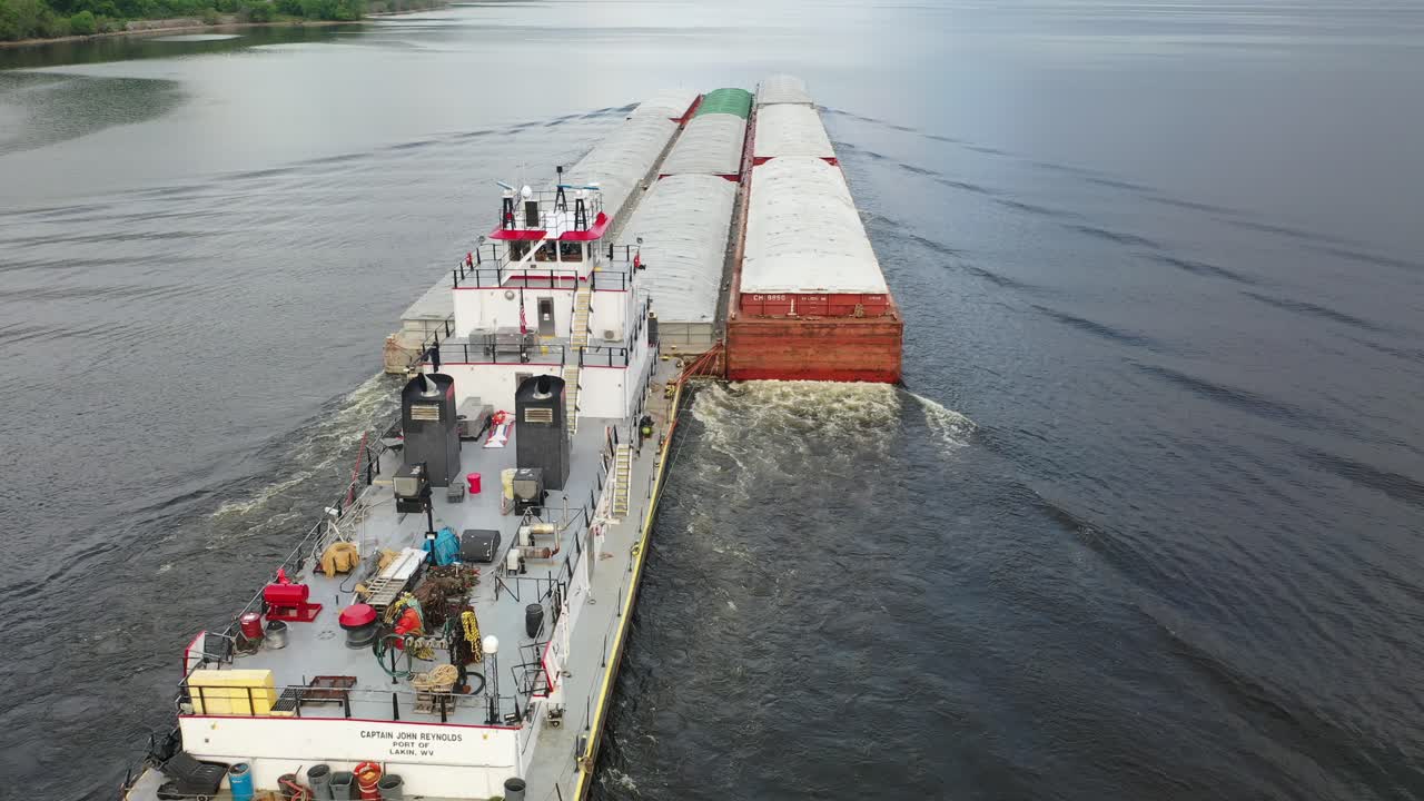Barge and Tugboat on River