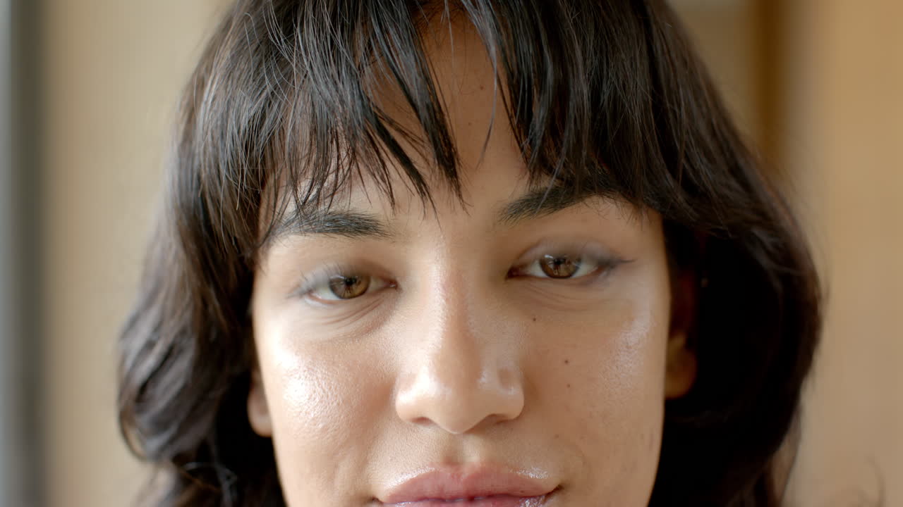 Smiling woman enjoying festive atmosphere at home during Christmas season