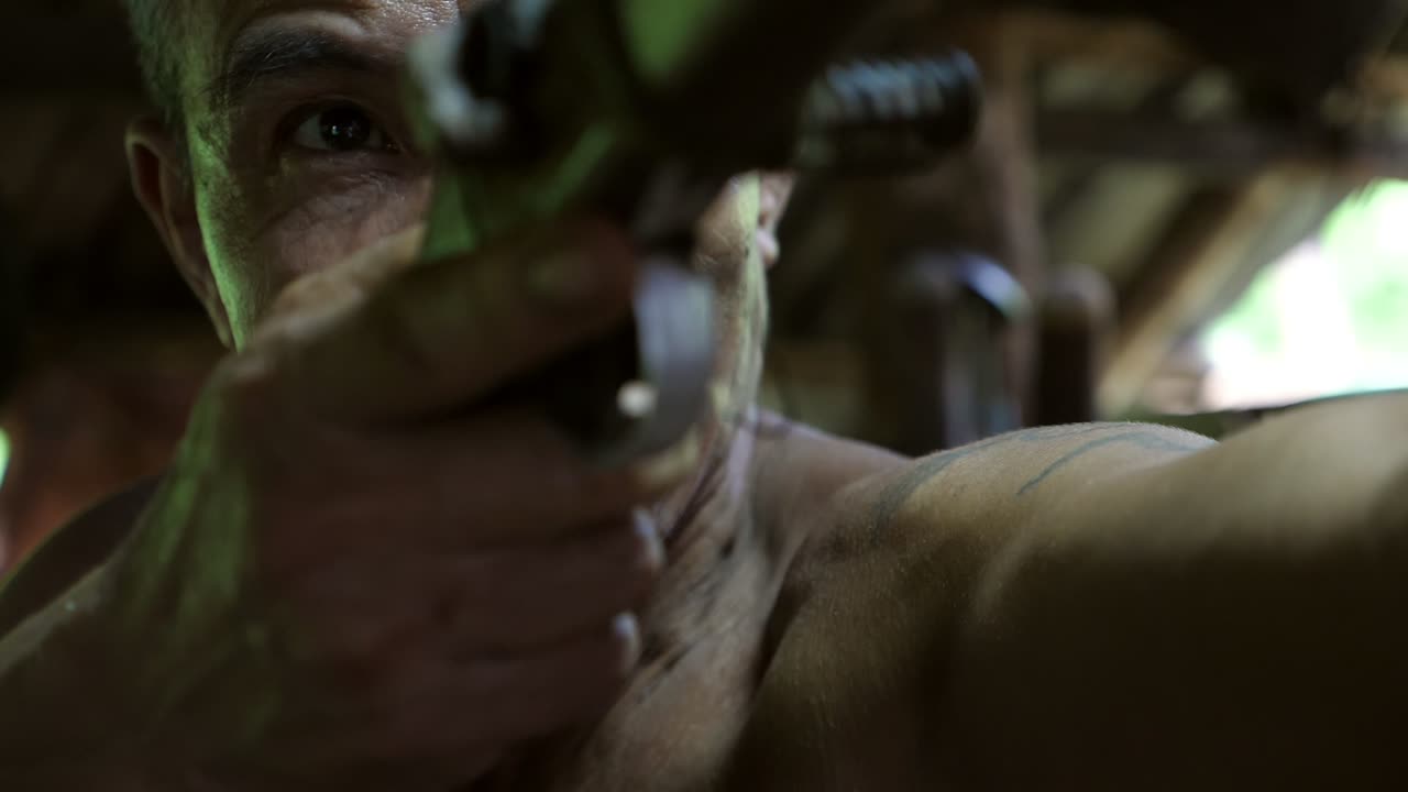 Asian The Elderly Target With Laser Sight