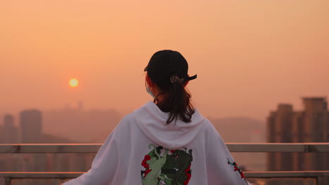 Back-view-lonely-Female-Girl-Beauty-Sad-Thinking-Overpass-Evening,-cute-sad-woman-being-depressed-under-orange-skyline-sunset