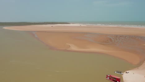 aerial: kitesurfing in the river delta of parnaiba, northern brazil