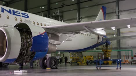 airplane maintenance in a hangar