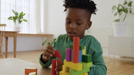 young boy playing at home