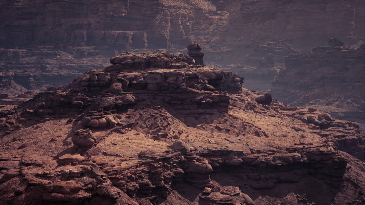 Stunning view of rocky terrain under soft light near a grand canyon at dusk