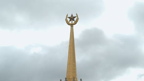 golden spire with star and crescent ornament