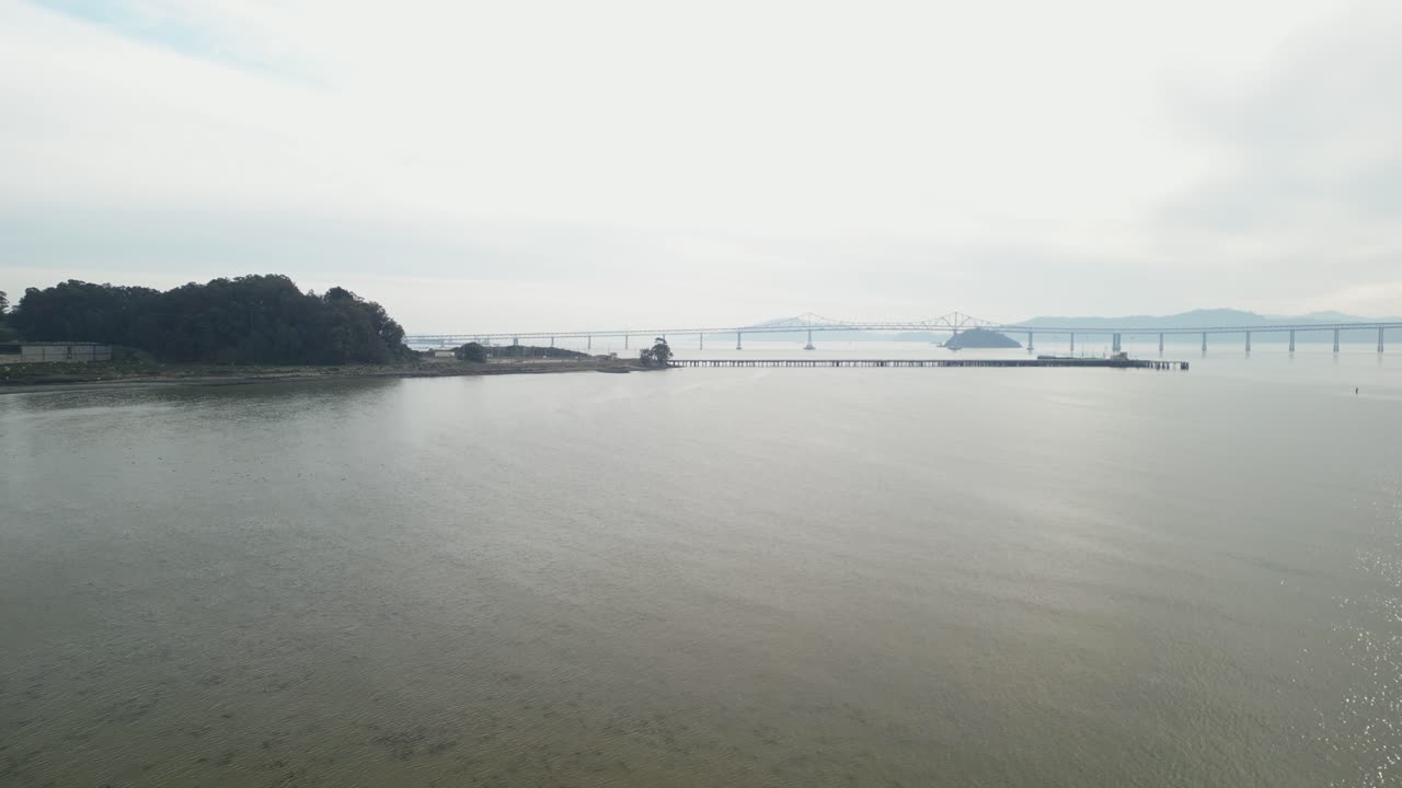 Aerial descend of Richmond Bridge from Point Molate Beach Richmond California USA