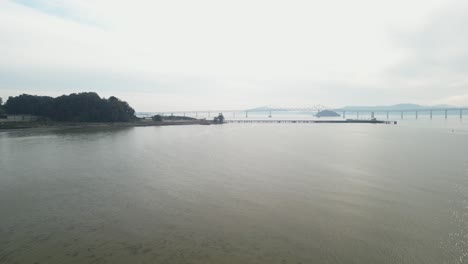 aerial descend of richmond bridge from point molate beach richmond california usa
