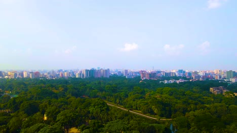 establish shot green park dhaka city skyline aerial clear sky bangladesh