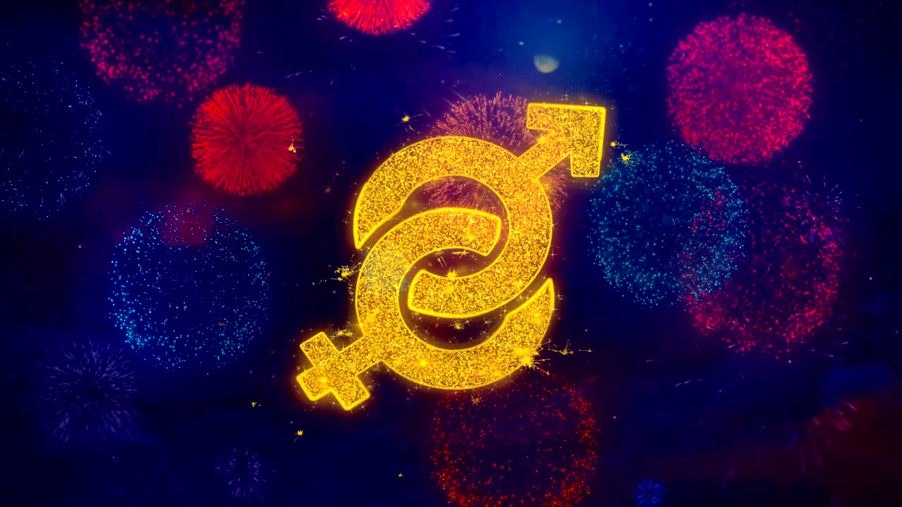 남성과 여성의 아이콘 상징은 다채로운 불꽃놀이 입자에 있습니다.