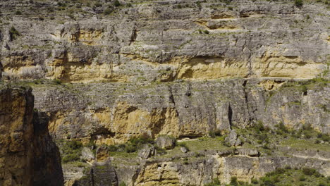 tilt-down reveal of the ancient monastery ruins of our lady of the angels de la hoz in hoces del rio duraton natural park in segovia, castile and leon, spain