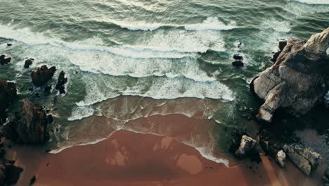 dramatic coastal scenery with waves crashing on a rocky beach