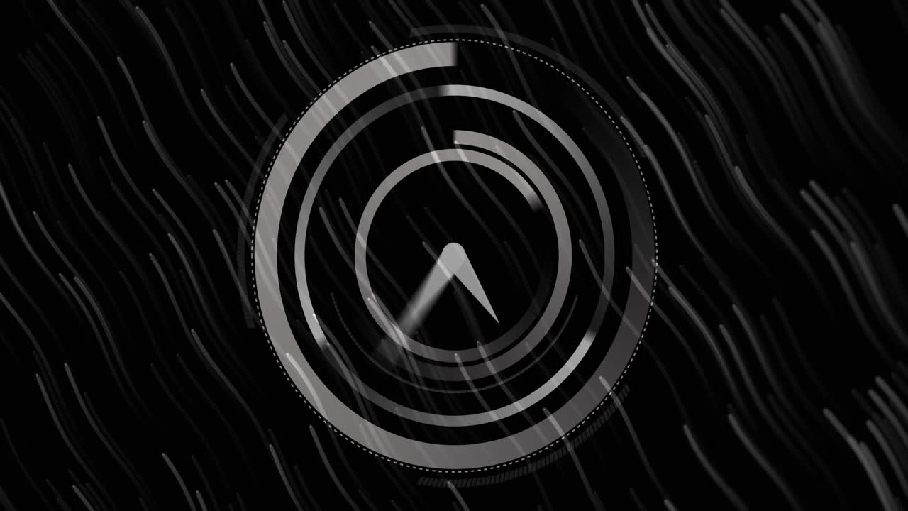 디지털 시계가 검은 바탕에서 움직이는 빛의 흔적에 맞춰 틱하고 있습니다.