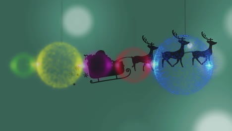 animation of christmas balls over santa claus in sleigh with reindeer